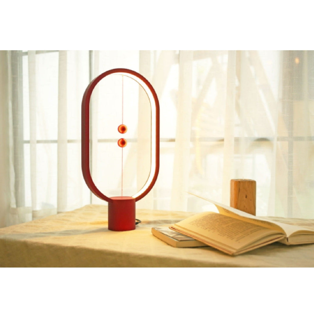 Heng Balance Lamp Ellipse - O lampă unică cu un întrerupător plutitor